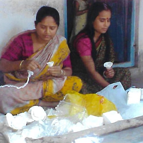 Women engaged in making shola crafts for sale Women engaged in making shola crafts for sale