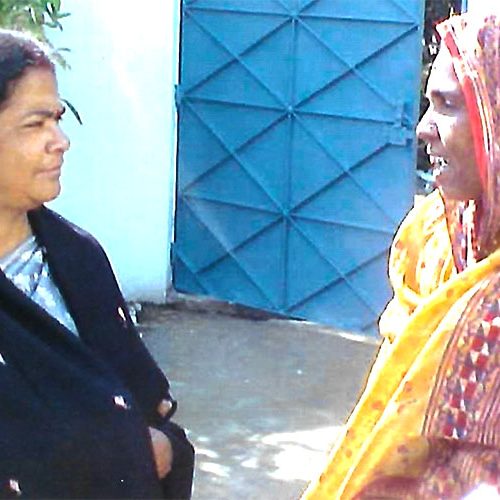 Mita Guha in conversation with a beneficiary of the Self Help Group Mita Guha in conversation with a beneficiary of the Self Help Group